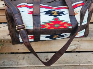 The Alpine Leather Duffel bag with saddle blanket wool western pattern (13)