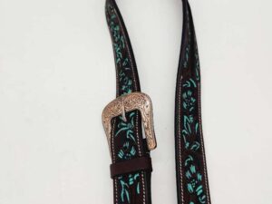 A brown leather belt with intricate turquoise and black floral embroidery along its length. The belt has a decorative, gold-toned metal buckle with engraved patterns. The background is plain white.