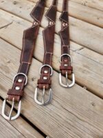 Elegant leather dog collar with bow tie design and paw print detail, perfect for a stylish and sophisticated pup (7)